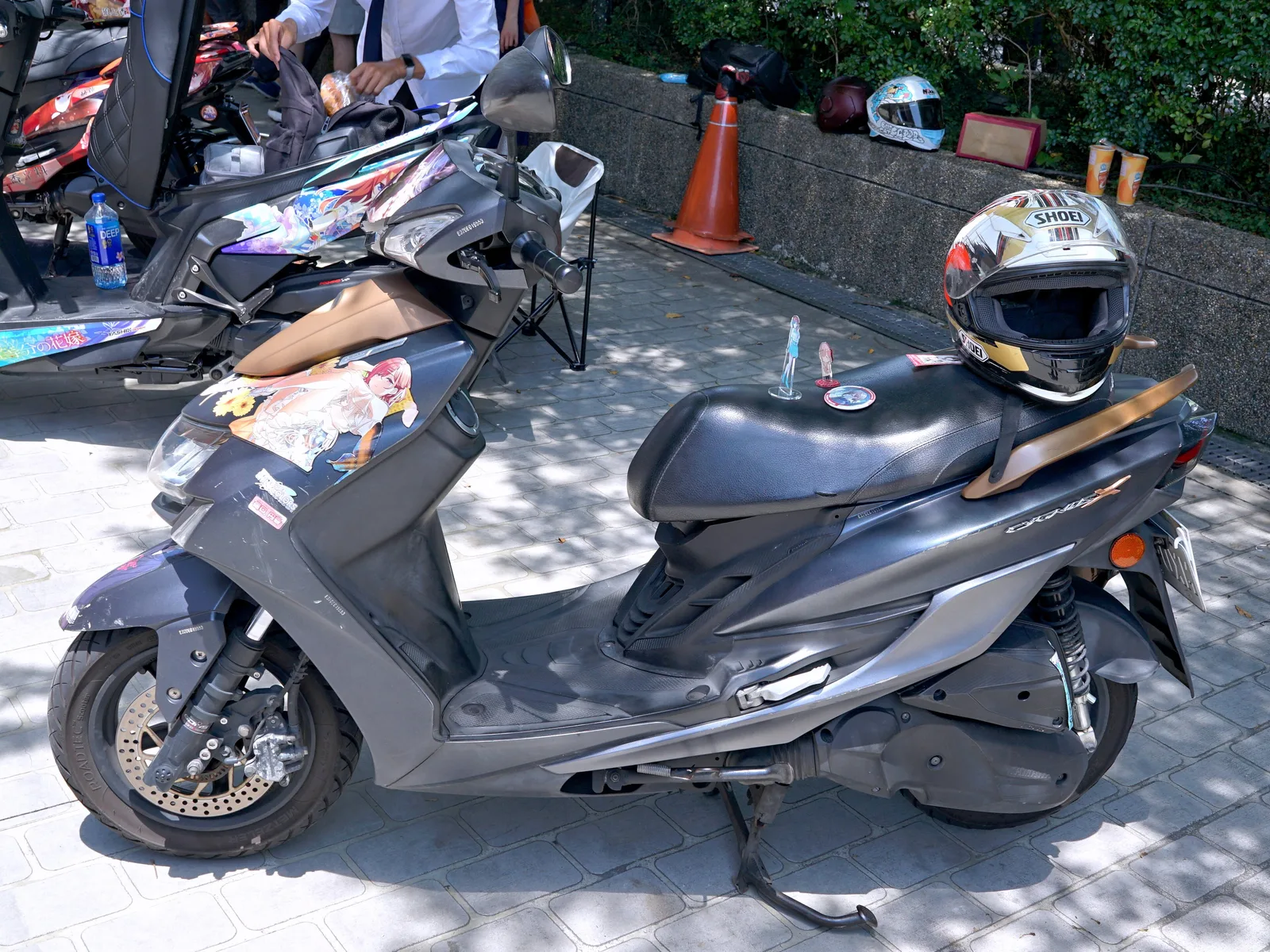 Madoka Higuchi itansha left side and helmet 20240811a